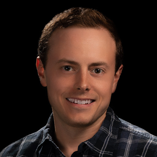 A portrait photo of Ross Paffett smiling